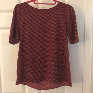Red short sleeve blouse with white detail